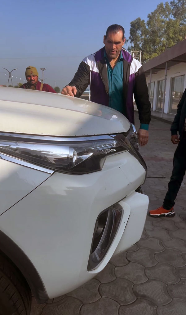 Great Khali Tries To Lift Toyota Fortuner