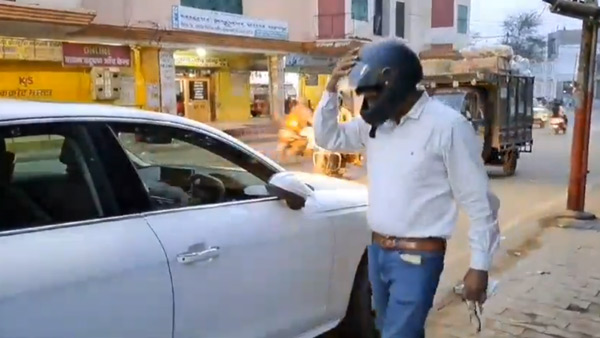 Audi Car Driver Wears Helmet