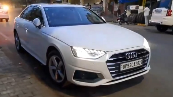 Audi Car Driver Wears Helmet