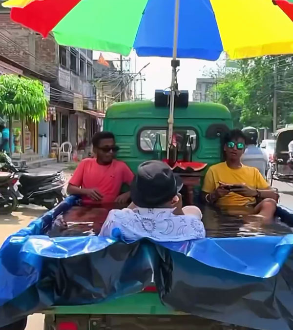 Moving Auto Rickshaw Swimming Pool