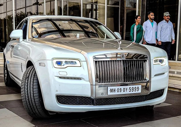 Rolls Royce Parked in Living Room Rolls Royce Parked in Living Room