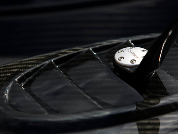 Carbon fiber surface covered in clear coat