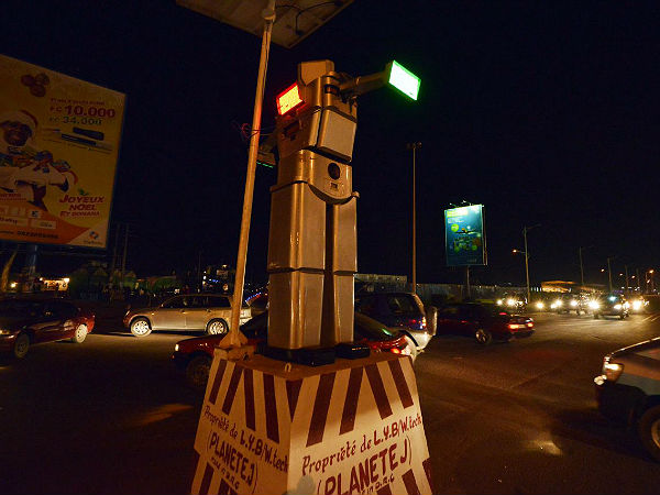Real Life RoboCop Directs Traffic In Congo