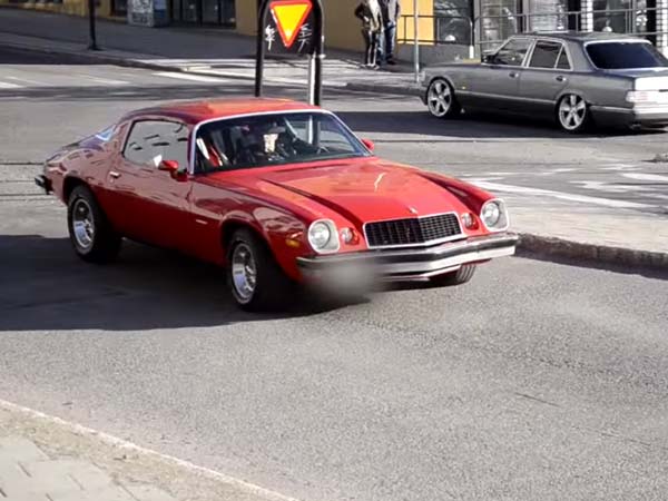 classic camaro hits pole doing burnout