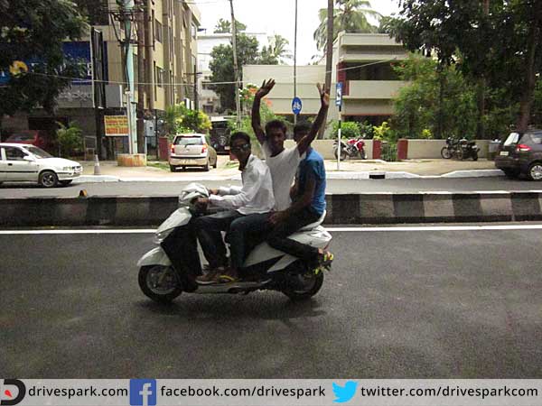 6. Riding triples on a motorcycle: