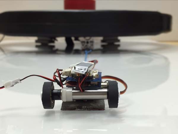 Tiny Robots Manage To Pull A Two Ton Car; But How?