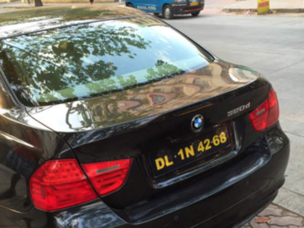 Black Number Plate With Yellow Writing