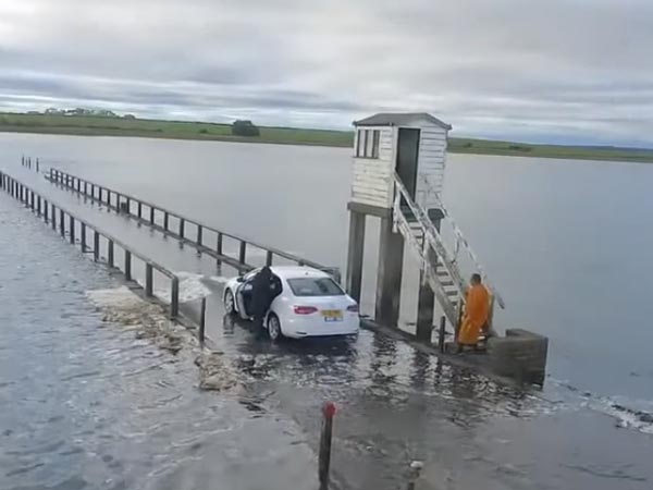 Uber Driver Battles The Rising Tide, Gets Caught