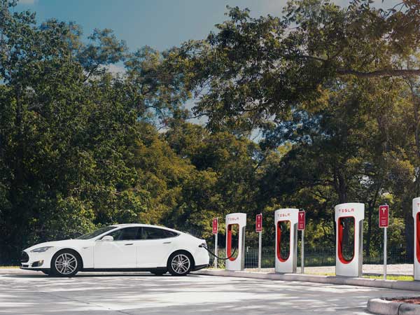 Tesla Ends Free Unlimited Use Of Supercharging Stations — Not For All Though