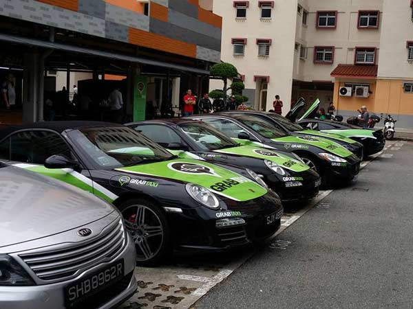 Honda Invests In Grab Taxi To Fend Off Uber's Ride Sharing Might 