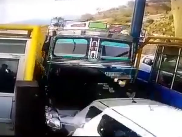 Caught On Tape: Truck Ploughs Through Toll Plaza