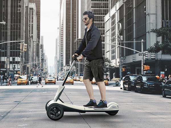This Transboard Folding E-Scooter Can Glide Over Bumps