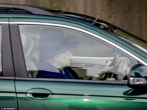 Queen Elizabeth II Drives Jaguar Back Home From Church