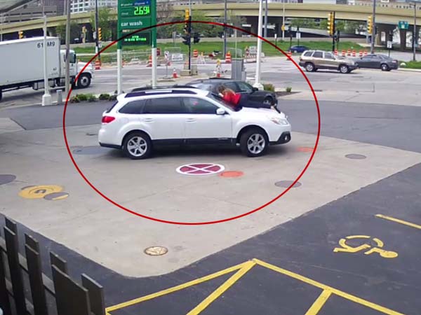 Woman Jumps On Top Of Her Car To Stop Thieves Video