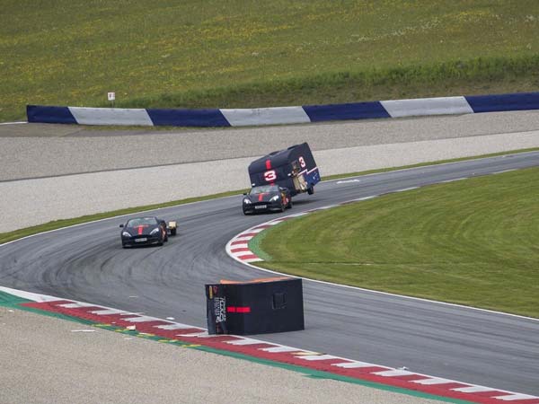 Watch This Lunatic Race Of Aston Martin Towing Campers Watch This Lunatic Race Of Aston Martin Towing Campers