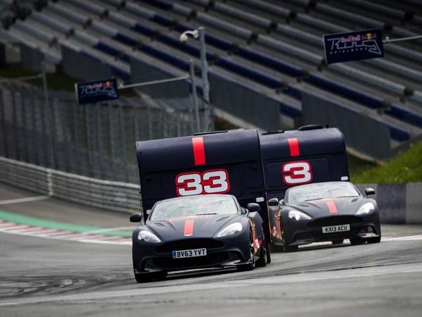 Watch This Lunatic Race Of Aston Martin Towing Campers Watch This Lunatic Race Of Aston Martin Towing Campers