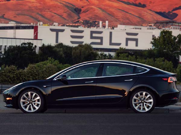 Elon Musk Finally Reveals Tesla Model 3