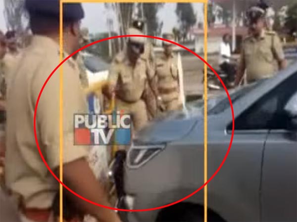 Karnataka MP Driving Innova Crysta Breaks Barricade And Almost Runs Over A Cop
