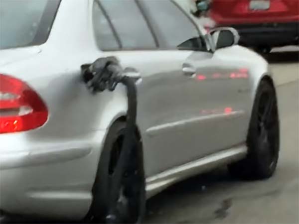 Mercedes-Benz Driven Around With Fuel Nozzle