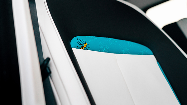 rolls-royce manchester ghost manchester bee seat motif