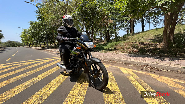 honda shine 100 tracking shot