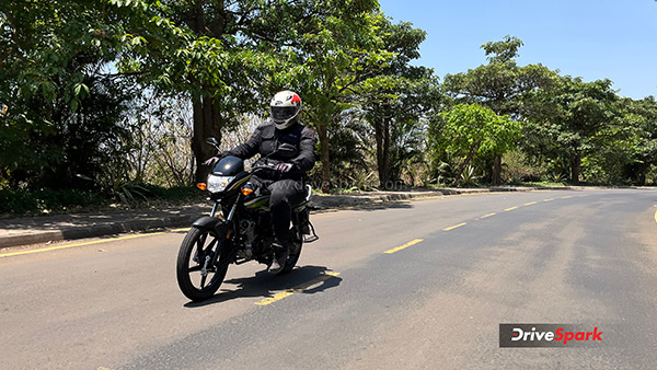 honda shine 100 tracking shot