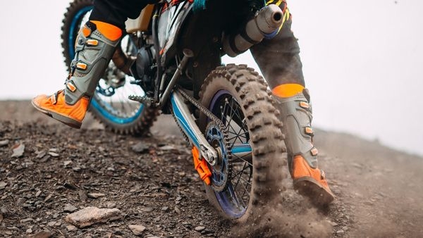 Rider wearing motorcycle boots while riding