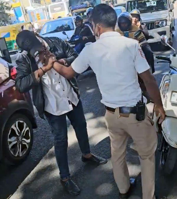 Bengaluru Rider Bites Cop