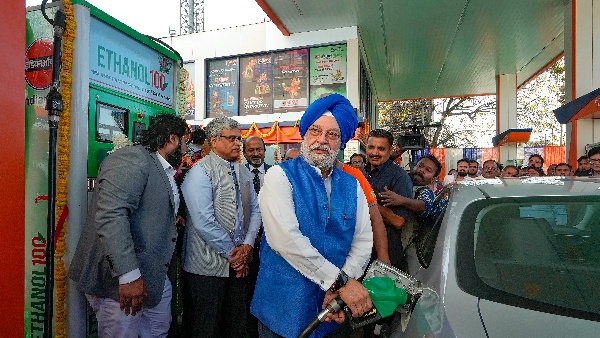Minister of Petroleum and Natural Gas Fills Up A Car With E100 Ethanol