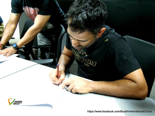 Indian cricketers driving Formula One track