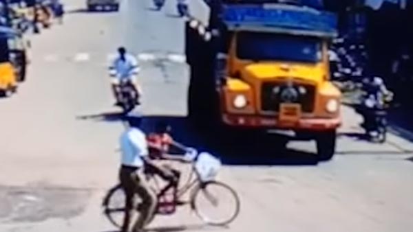 ಯಮರೂಪಿ ಟ್ರಕ್‍‍ನಿಂದ ಬಾಲಕನ ಪ್ರಾಣ ಉಳಿಸಿದ ಪೊಲೀಸಪ್ಪ..!