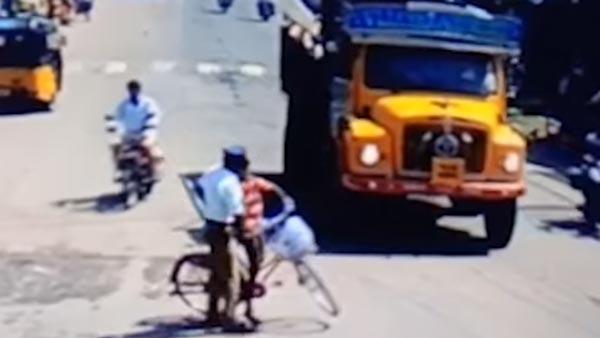 ಯಮರೂಪಿ ಟ್ರಕ್‍‍ನಿಂದ ಬಾಲಕನ ಪ್ರಾಣ ಉಳಿಸಿದ ಪೊಲೀಸಪ್ಪ..!