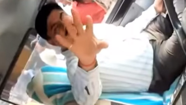 ಸಂಚಾರಿ ನಿಯಮ ಉಲ್ಲಂಘಿಸಿದ ಆರ್‍‍ಟಿಒ ಅಧಿಕಾರಿಗೆ ಸಾರ್ವಜನಿಕರಿಂದ ಕ್ಲಾಸ್