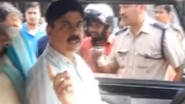 ಸಂಚಾರಿ ನಿಯಮ ಉಲ್ಲಂಘಿಸಿದ ಆರ್‍‍ಟಿಒ ಅಧಿಕಾರಿಗೆ ಸಾರ್ವಜನಿಕರಿಂದ ಕ್ಲಾಸ್