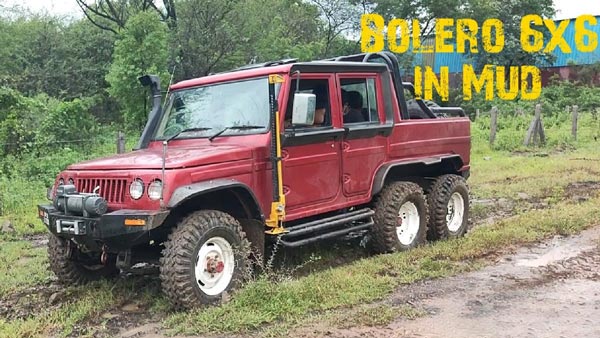 ಮಹೀಂದ್ರಾ ಮೇಜರ್ ಕಾರನ್ನು ಕೆಸರಿನಿಂದ ಹೊರಗೆಳೆದ ಆರು ಚಕ್ರಗಳ ಮಹೀಂದ್ರಾ ಬೊಲೆರೊ