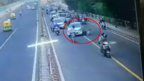 ಟ್ರಾಫಿಕ್ ಪೊಲೀಸ್ ಗೆ ಗುದ್ದಿ ಬಾನೆಟ್ ಮೇಲೆ ಹೊತ್ತೊಯ್ದ ಕಾರು ಚಾಲಕ