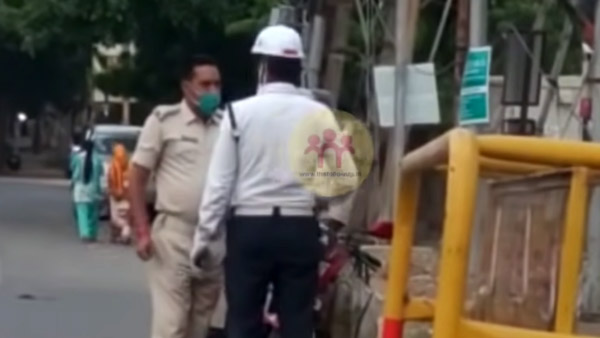 ಸಾರ್ವಜನಿಕ ರಸ್ತೆಯಲ್ಲಿ ಪರಸ್ಪರ ಹೊಡೆದಾಡಿ ಕೊಂಡ ಪೊಲೀಸರು