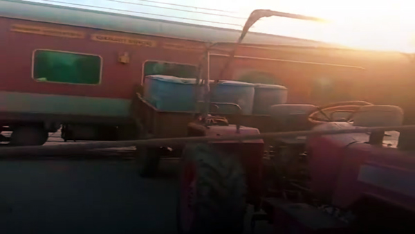 Tractor Gets Stuck At Railway Crossing