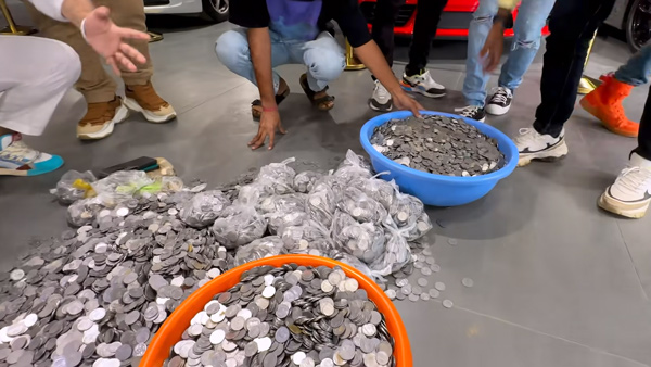 you-tuber-buys-car-worth-1-crore-coins-viral-video