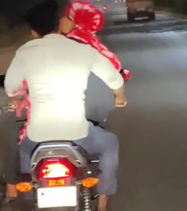 Young Man Rides Bike With Girlfriend