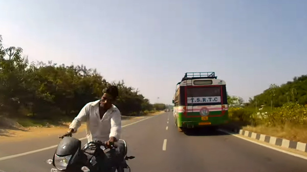 viral-video-wrong-side-biker-crashes-into-hyundai-venue-in-highway