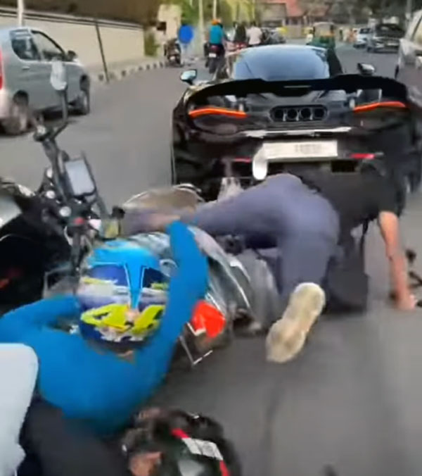 scooter-rider-hits-mclaren-765lt-supercar-in-bengaluru-viral-video
