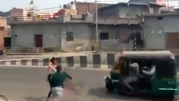 holi-festival-water-balloons-auto-overturned-video-viral