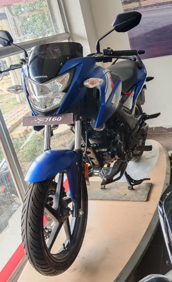 karnataka GruhaLakshmi Scheme Funds a Woman Paid Down Payment For Her Son Honda Bike