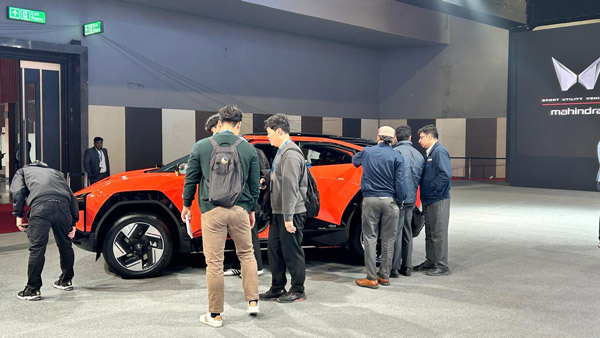 anand-mahindra-shared-post-of-japanese-visitors-taking-pics-of-be-6-xev-9e