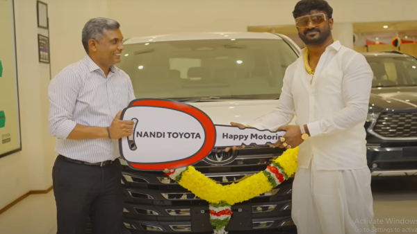 farmer-arrives-on-bullock-cart-to-take-delivery-of-vellfire