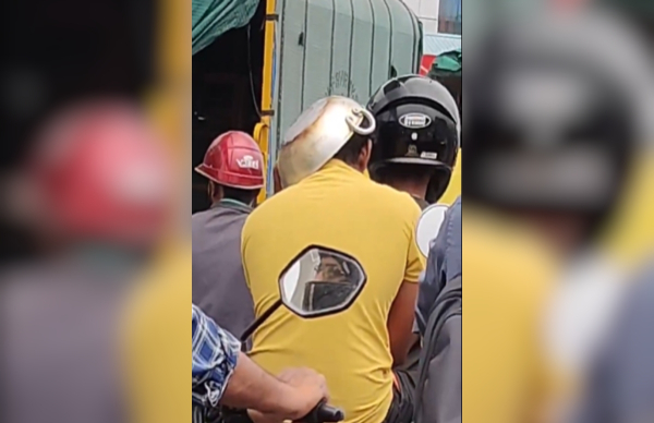 bengaluru-man-uses-frying-pan-as-helmet-to-escape-traffic-fine