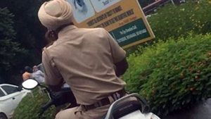 പുതിയ നിയമത്തില്‍ പിടിവീണ് പൊലീസ് ഉദ്യോഗസ്ഥന്‍