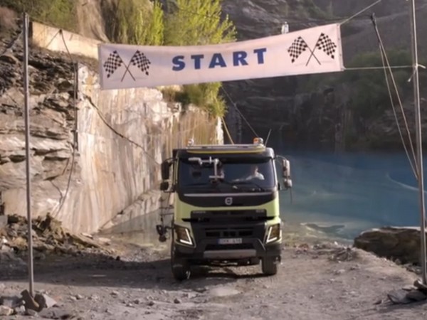 Hamster Drives A Volvo Truck Up A Quarry