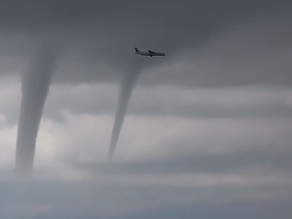 ചുഴലിക്കൊടുങ്കാറ്റുകള്‍ക്ക് ഇടയിലൂടെ ഒരു ആകാശയാത്ര; വീഡിയോ വൈറൽ